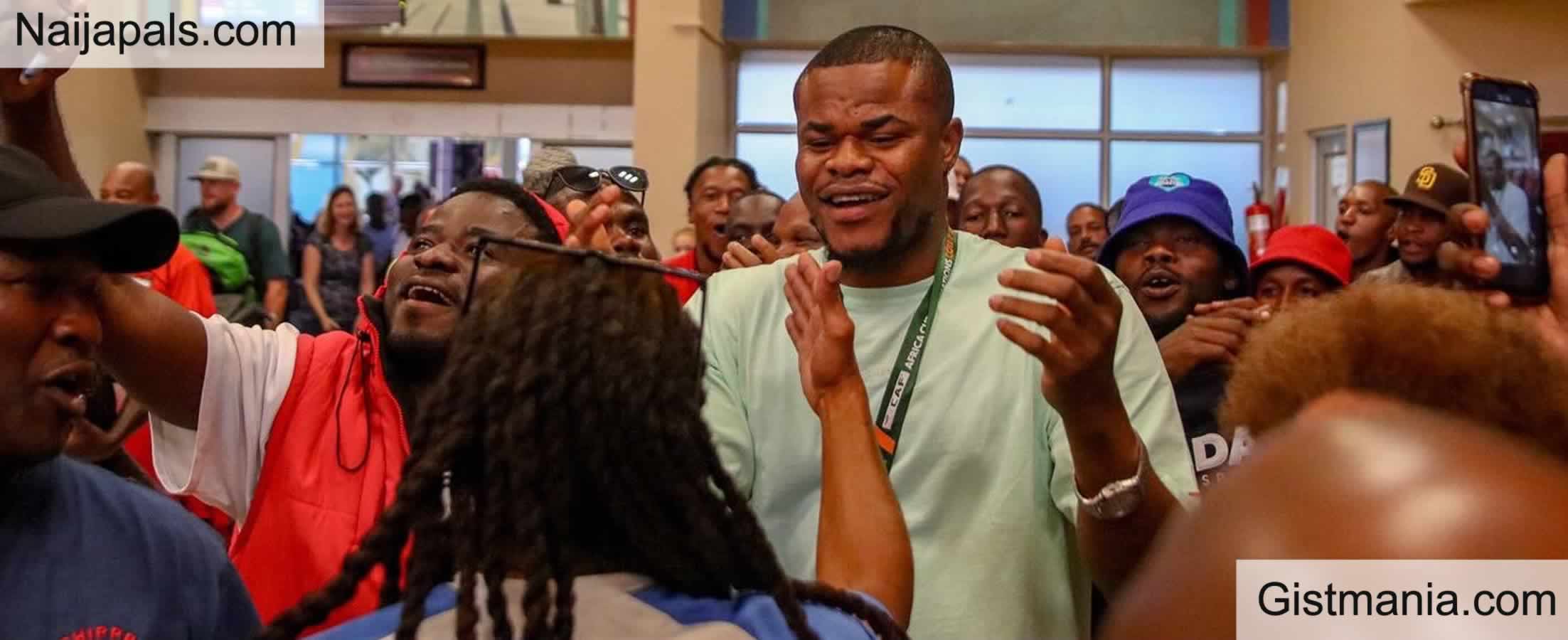 Super Eagles goalkeeper Stanley Nwabali given a hero's welcome on arrival in South Africa